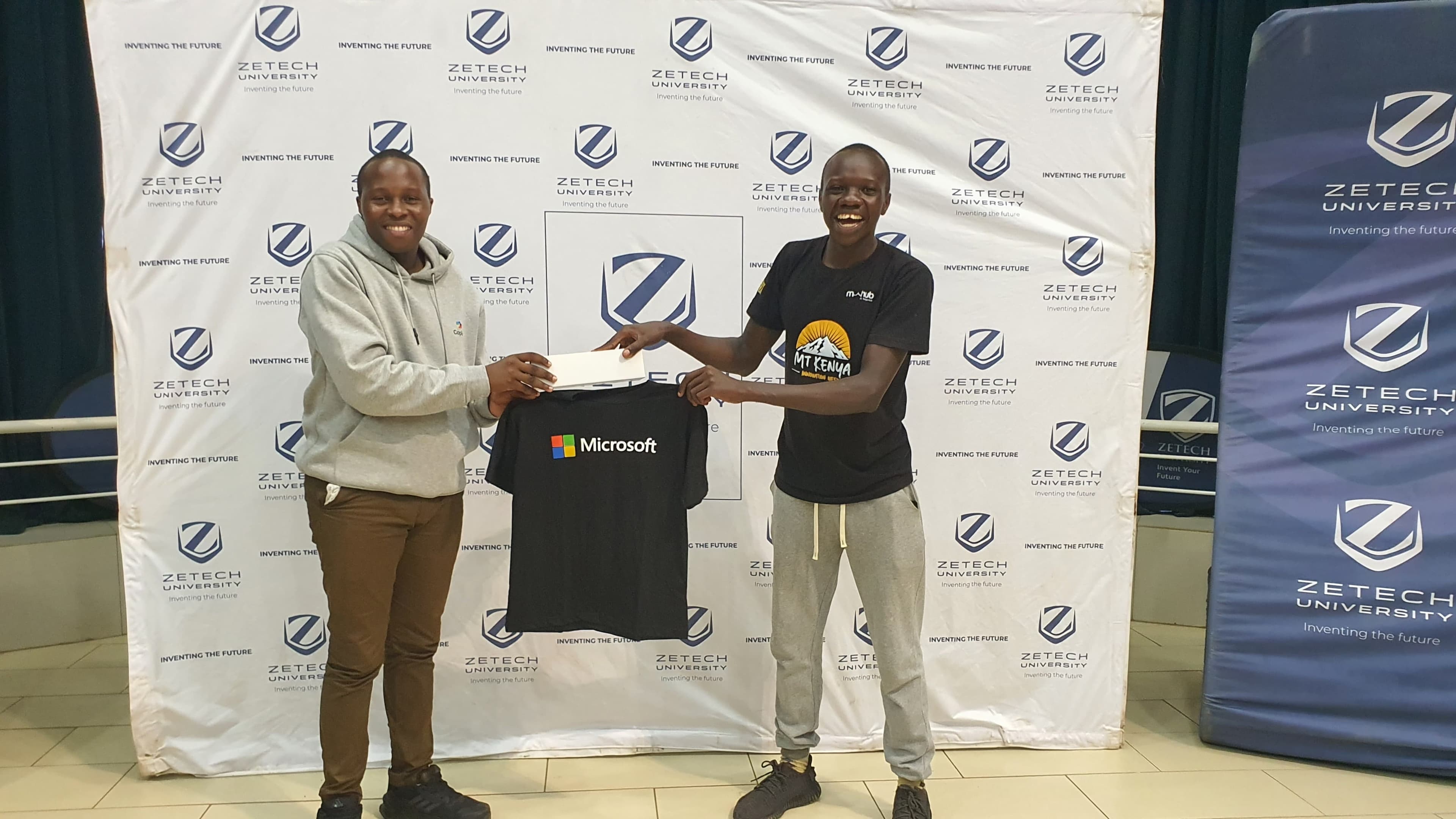 Simon Juma speaking at tech event